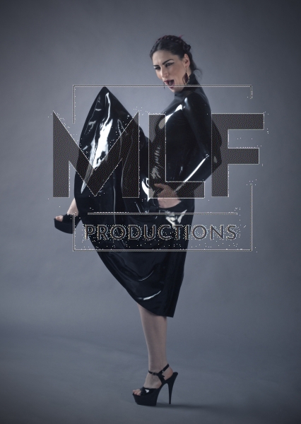 Long latex skirt with trouser pockets